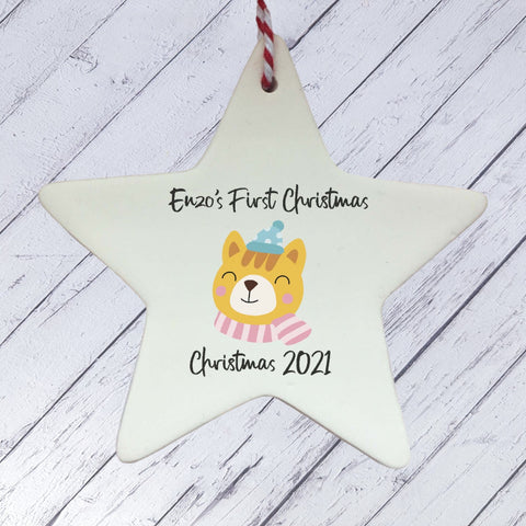 a ceramic star ornament with a dog on it