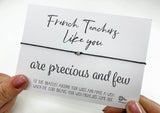 a person holding a card with a message on it