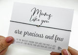 a person holding a card with a message on it