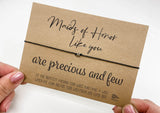 a person holding a card with a message on it