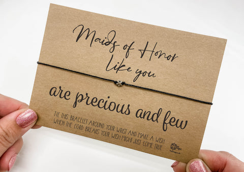 a person holding a card with a message on it
