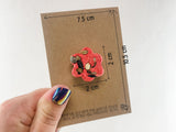 a person holding a piece of paper with a flower on it